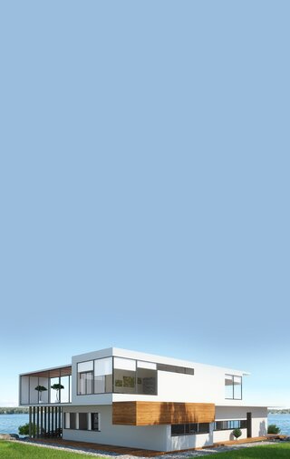 Modern house facade with minimalist design in dark and white tones, warm lighting and a well-kept front garden